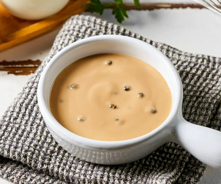 creamy peppercorn sauce in a bowl